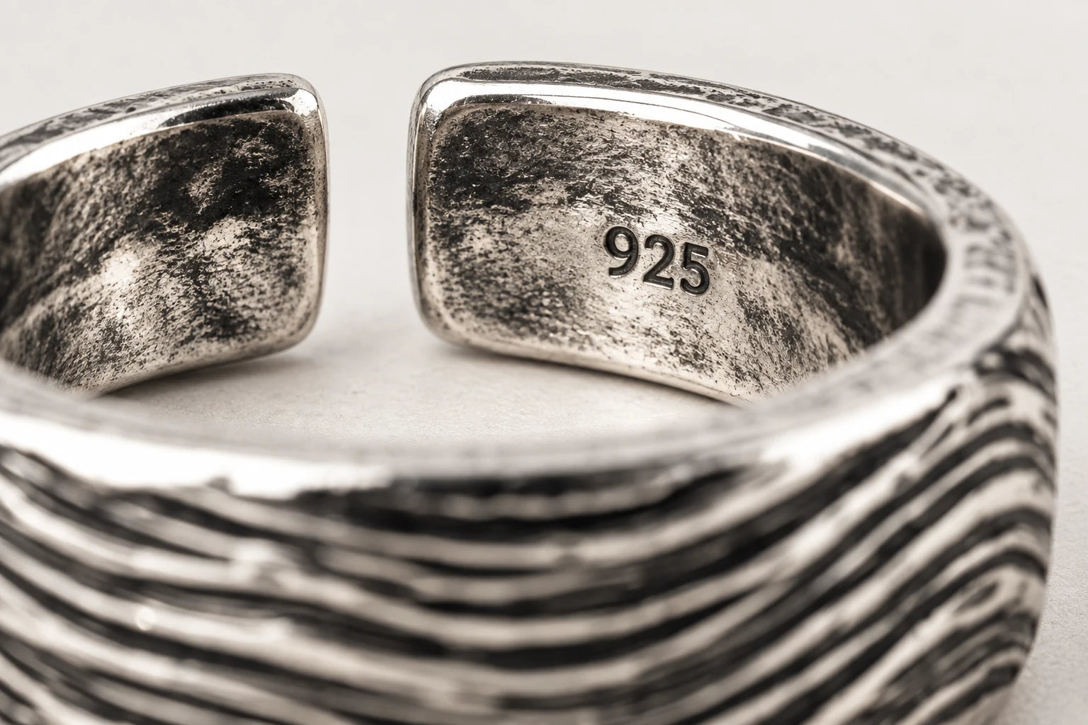 925 hallmark inside a solid sterling silver ring