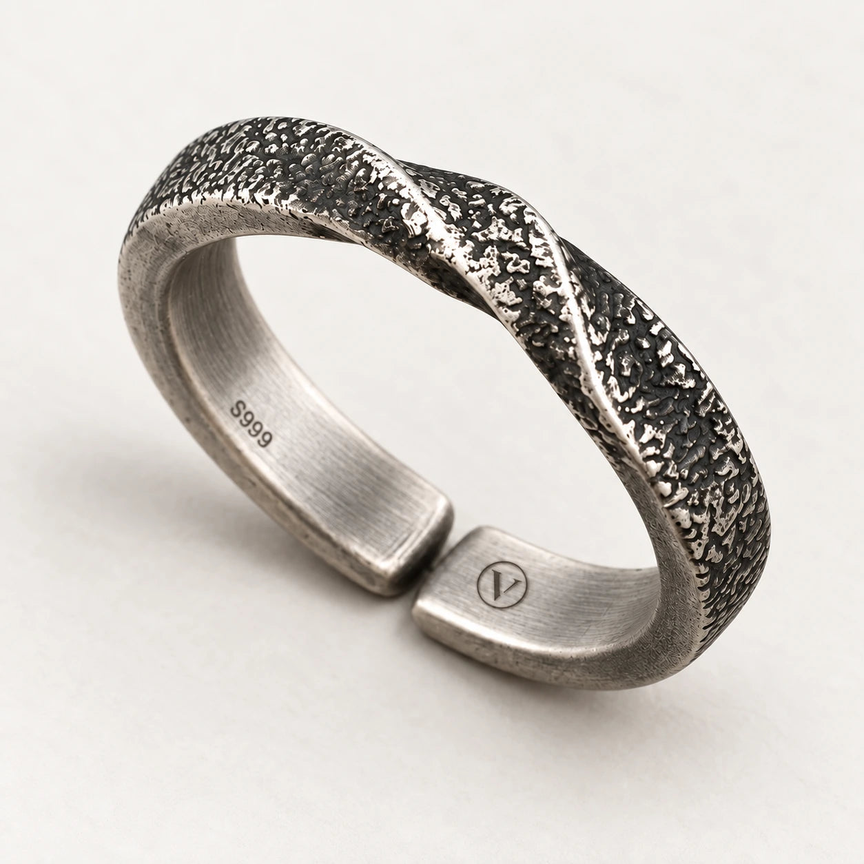 Oxidized Mobius ring with a textured twist and open back